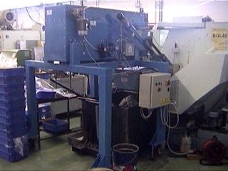 Machine automatique spciale pour appliquer un traitement de protection sur des pices mcaniques